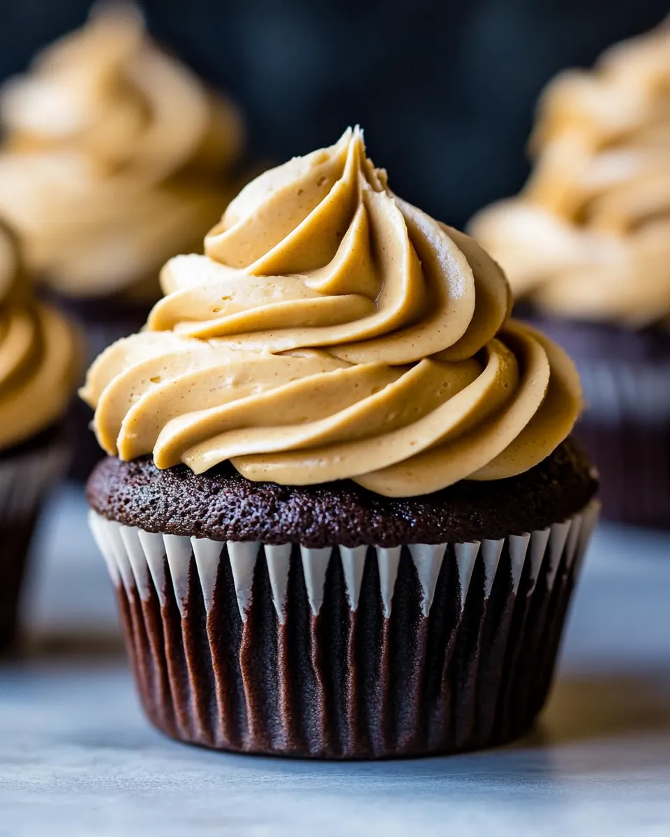 Homemade Dark Chocolate Cupcakes with Peanut Butter Frosting photo