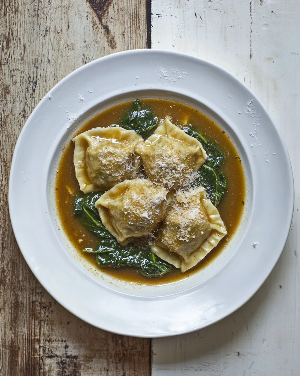 Classic spinach & ricotta dumplings in vegan umami broth image